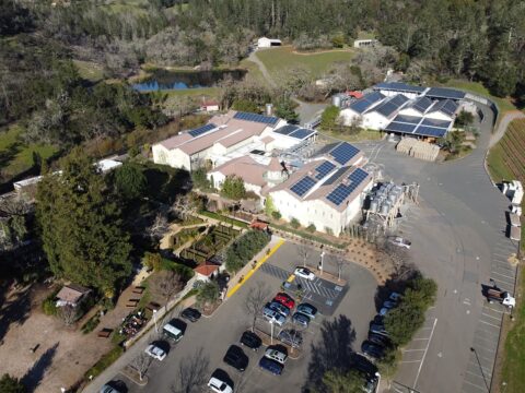 Aerial view of winery with rooftop solar panels