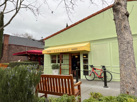 Exterior of Bouchon Bakery with red bicycle