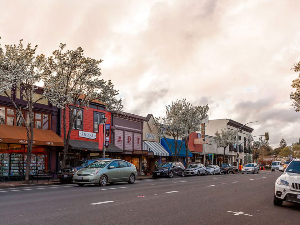 Colorful storefronts along small-town main street