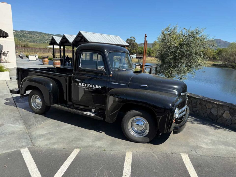 Vintage black pickup truck at Napa winery