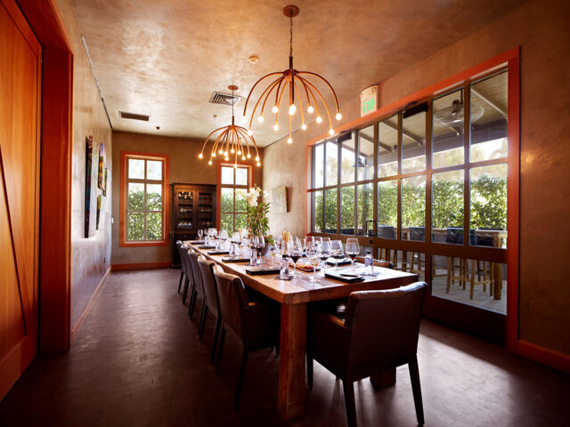 Elegant private dining room with long wooden table