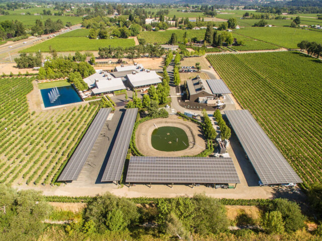 Aerial view of vineyard estate with solar panels